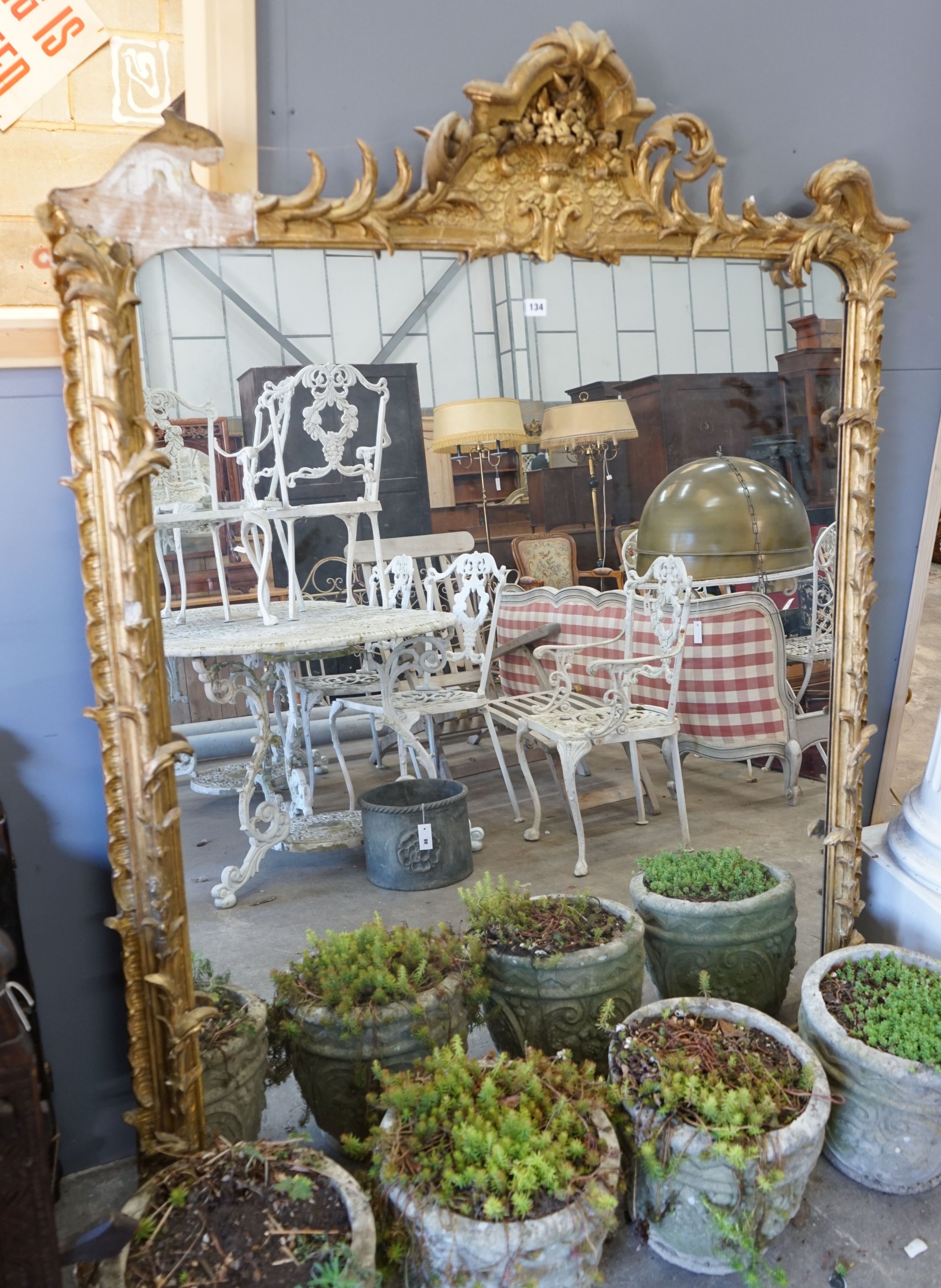 A Victorian giltwood and gesso overmantel mirror, width 130cm, height 168cm